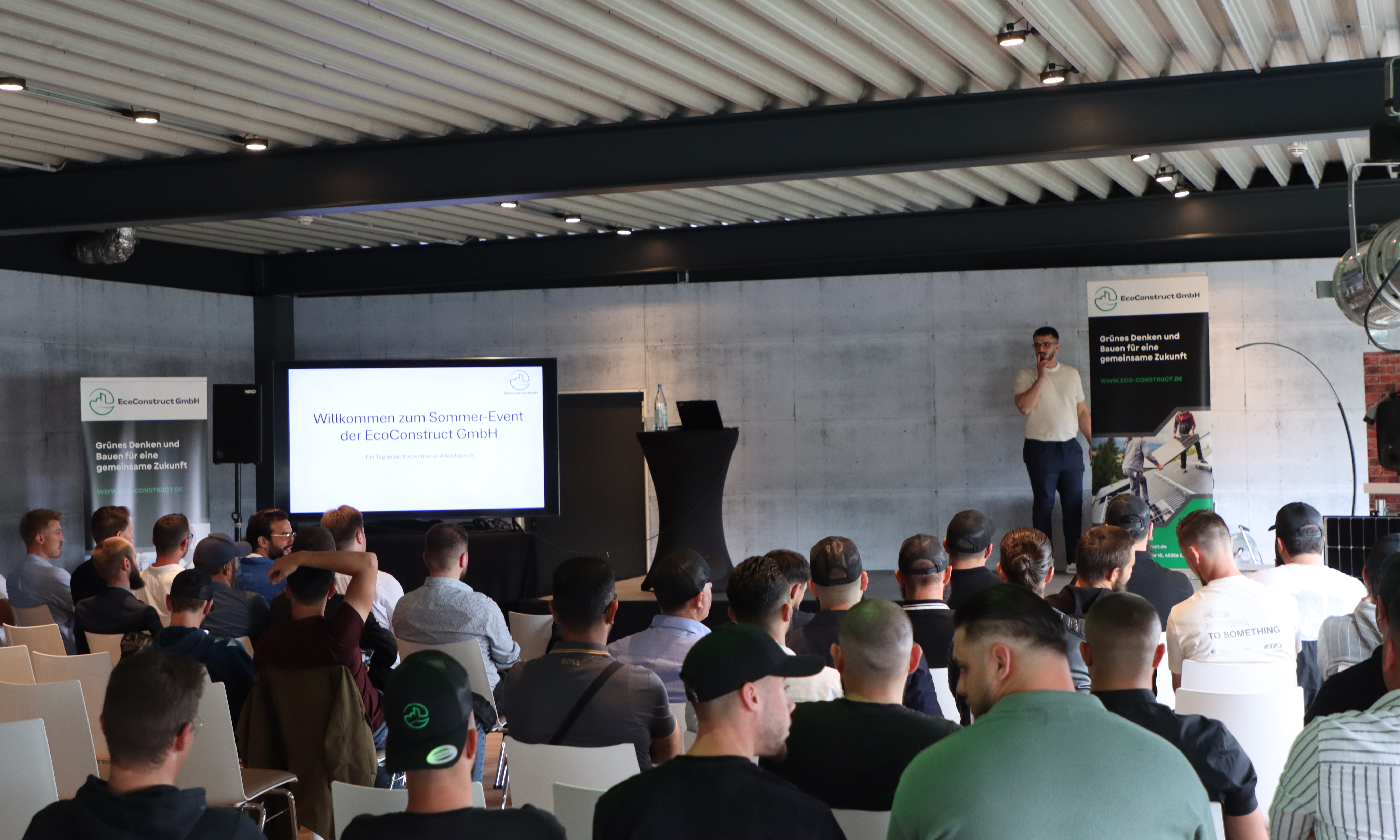 A render of three white cylindrical columns, against a warm creme background